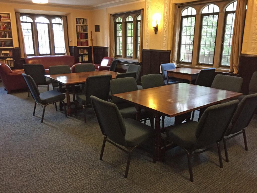 Side angle of tables and chairs in Fireside room