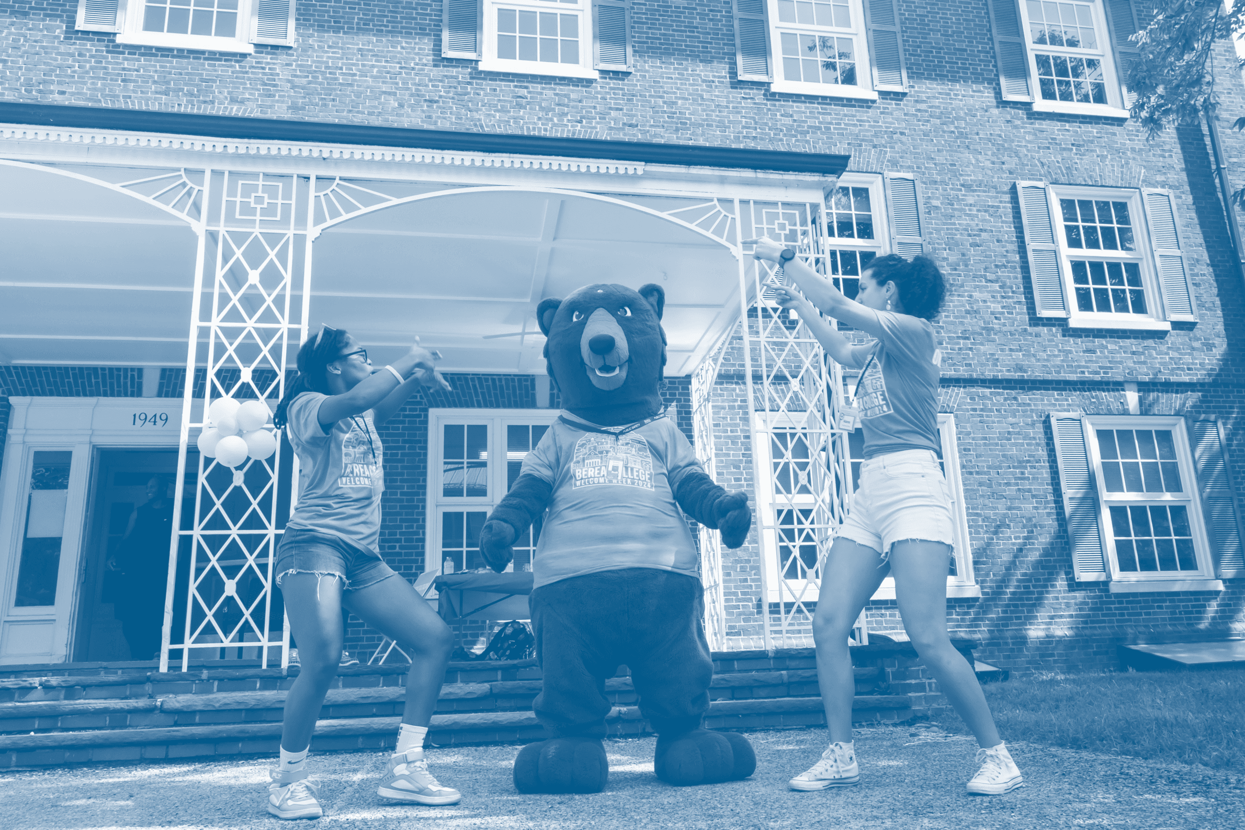 Berea's mascot, Blue, with students.